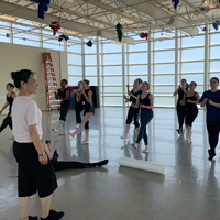 Jie Wang led high school students through a master class.