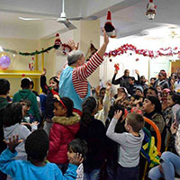 Webster Athens Study Abroad and Local Students Hold Holiday Party for Refugee Children in Athens