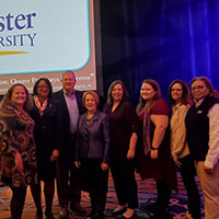 Webster representatives accept the award at CCME