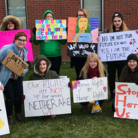Students in the Introduction to Women and Gender Studies course at the Feminism Awareness Project on Dec. 7