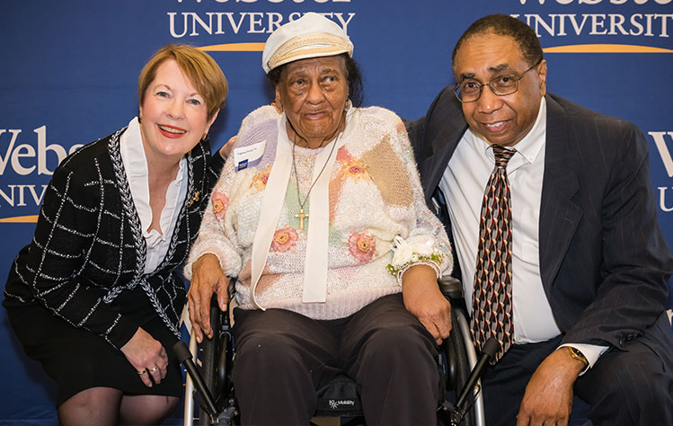 Chancellor Stroble with Eugenia Young and her son. 