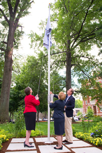 Robb raising the Centennial Flag