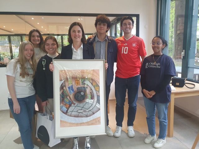 Julianna Sandholm-Bark, professor of art, with her art appreciation course students.