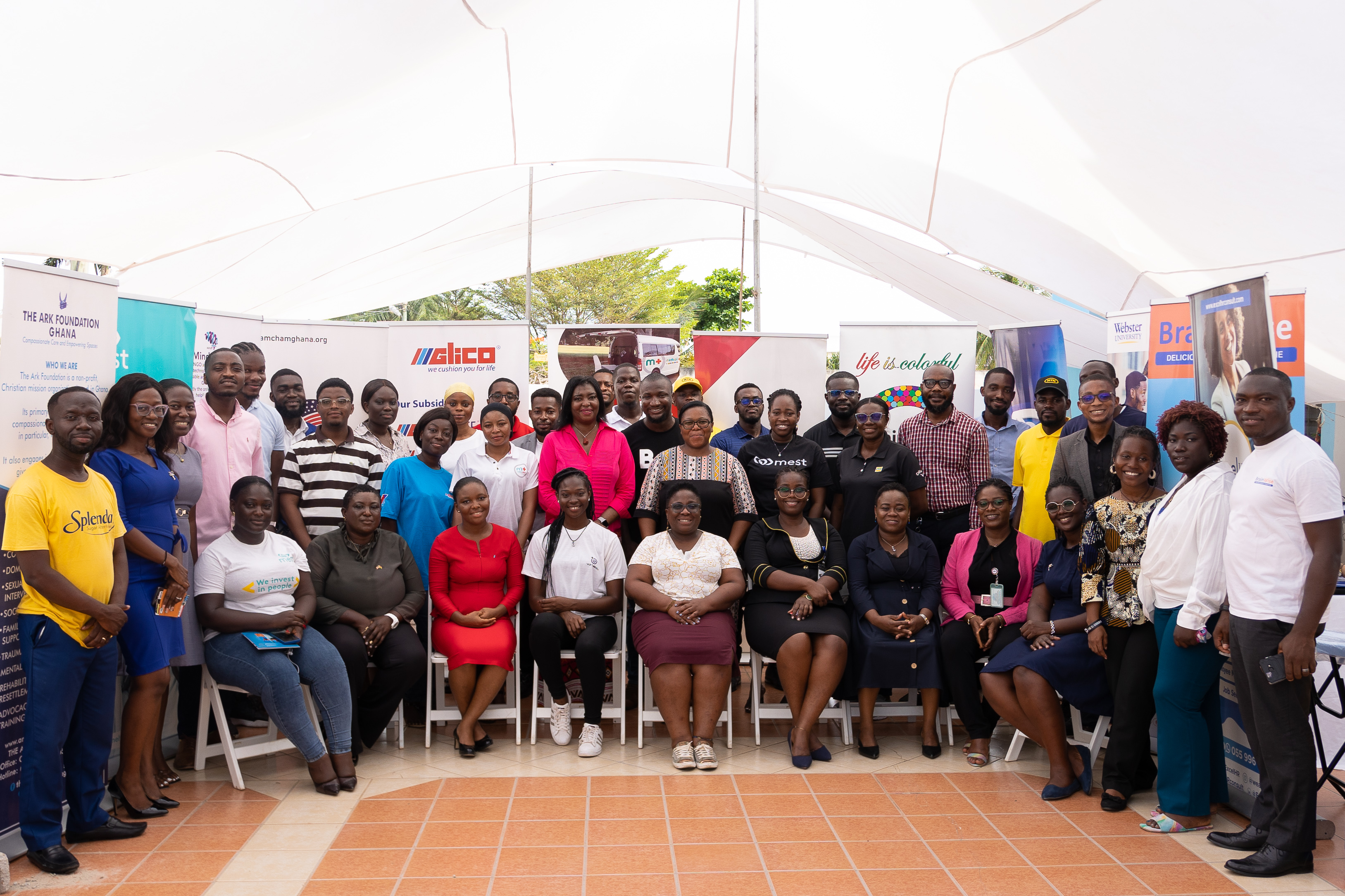Employer representatives, Webster Ghana faculty, staff, and a student intern pose for a group picture at Webster Ghana's second career fair.
