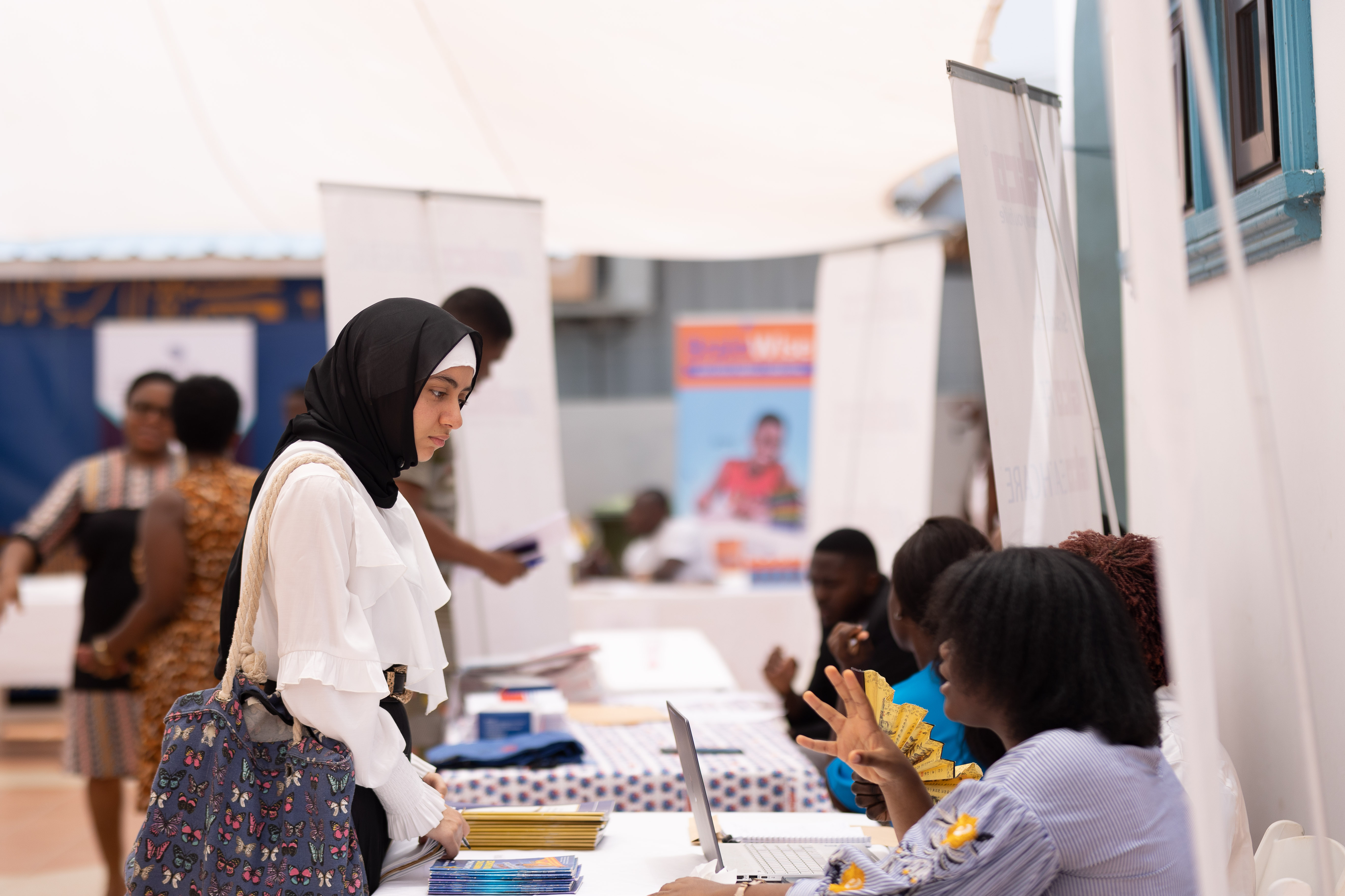 A Ghana student speaks with an employer.