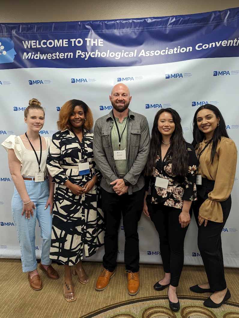 Webster psychology students, along with professor Eric Goedereis at the Midwestern Psychological Association Conference