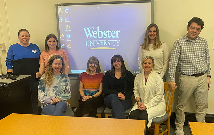 Participants and Professor Debbie Stiles after a PREPaRE workshop session.