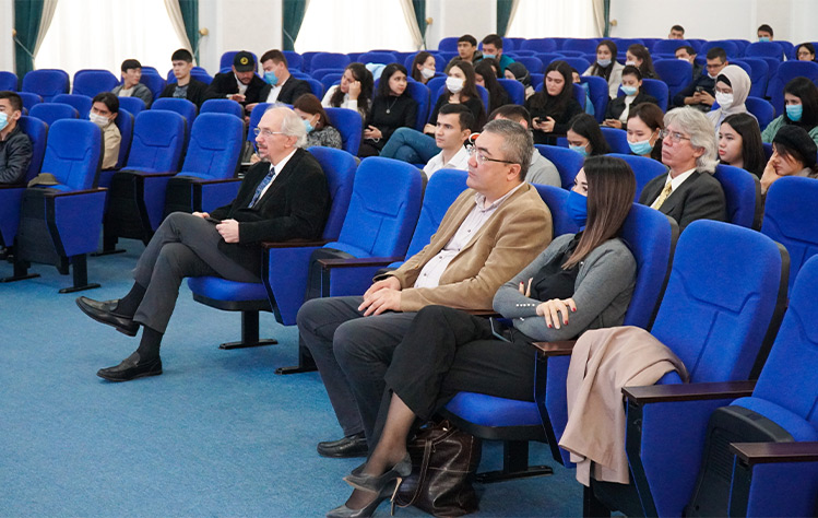 Audience members participate in the Q&A