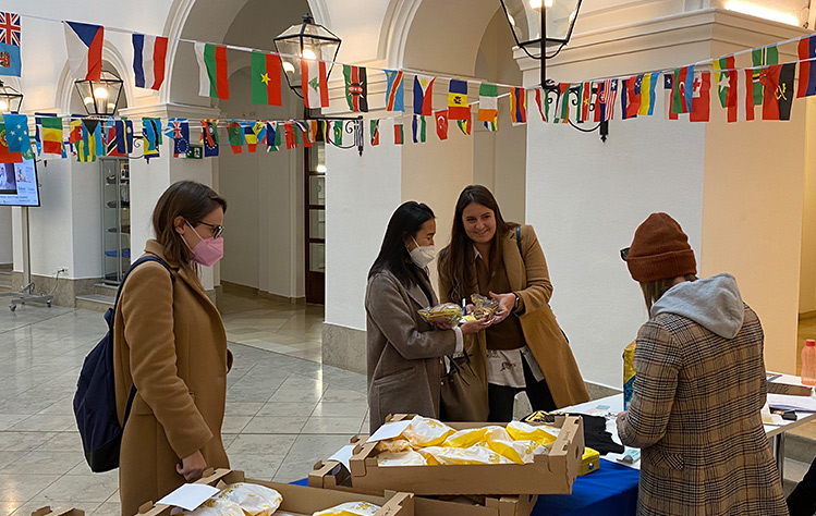 Community members enjoying treats in the Palais Wenkheim