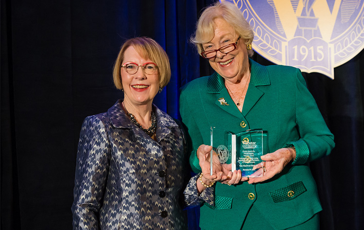 Chancellor Stroble and Dwyer-Dobbin with the Visionary Award