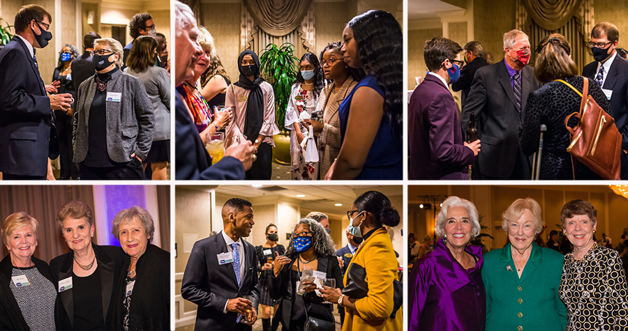 Attendees in conversation at the Webster Society Dinner