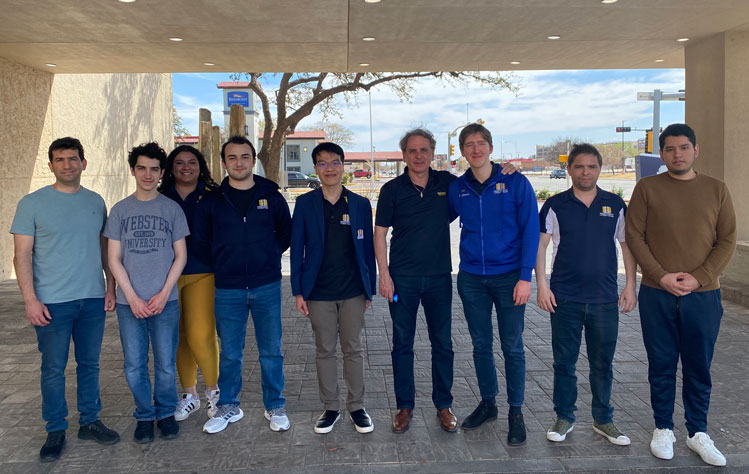 Webster's Chess Team and President Schuster after the team placed second in the nationals