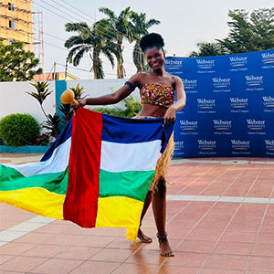 A Webster Ghana student performs a cultural dance.