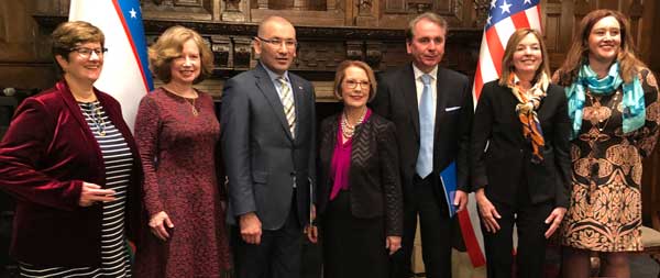 Webster officials celebrate with representatives of the Republic of Uzbekistan after signing a new joint agreement to expand educational opportunities in that country.