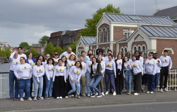 Webster students attending the GSLS gather for a group photo outside of Webster Leiden, where the summit was held in 2023.