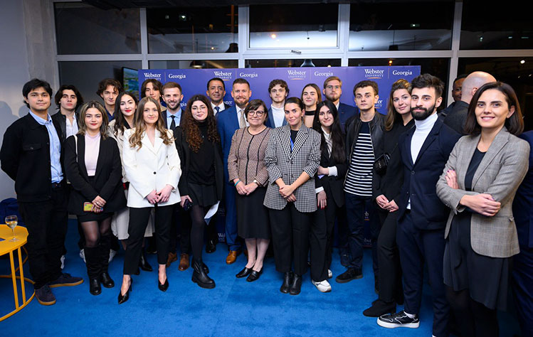 Nancy Hellerud with students and guests at the Georgia campus