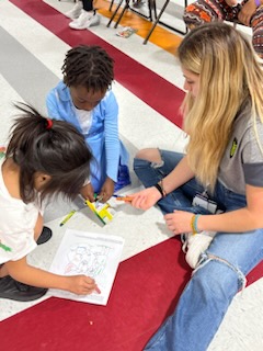 Isabella Ocampo plays with immigrant children at the Texas/Mexico border.