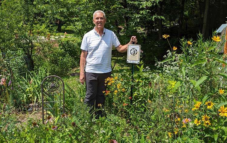 Ned Siegel in his garden