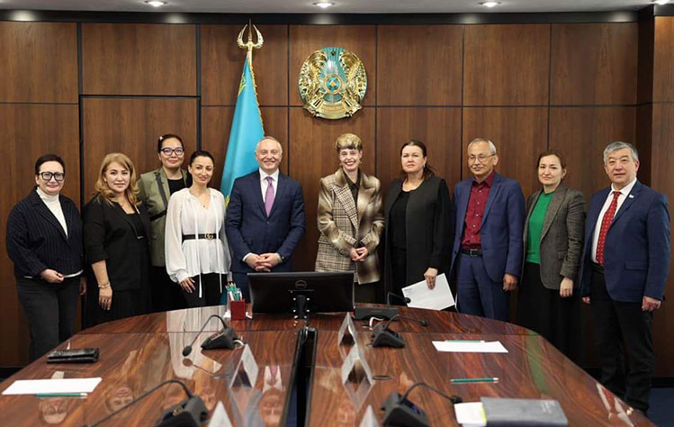 Mahfood (center) meets with Kazakhstan's vice minister of education (right of Mahfood) and other education officials.