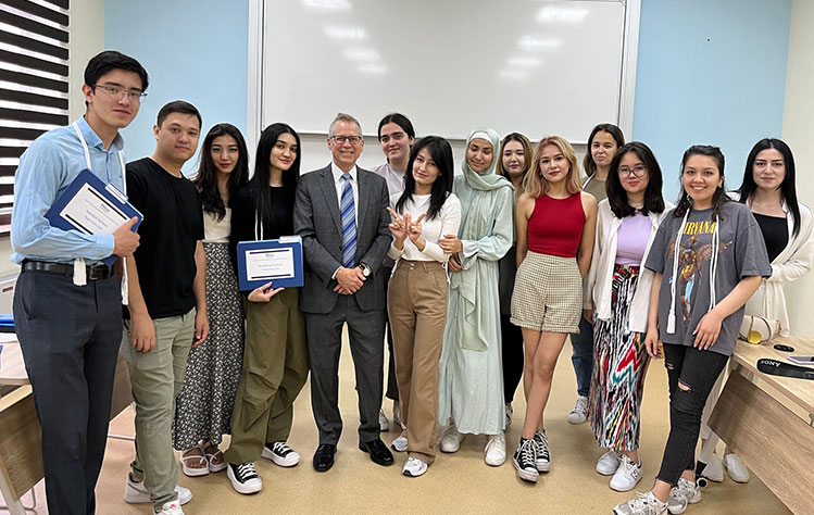Dean Eric Rothenbuhler with graduating students in Media Studies in 2023.