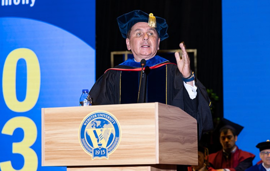 Webster University President Julian Schuster addresses Webster University Tashkent graduates.