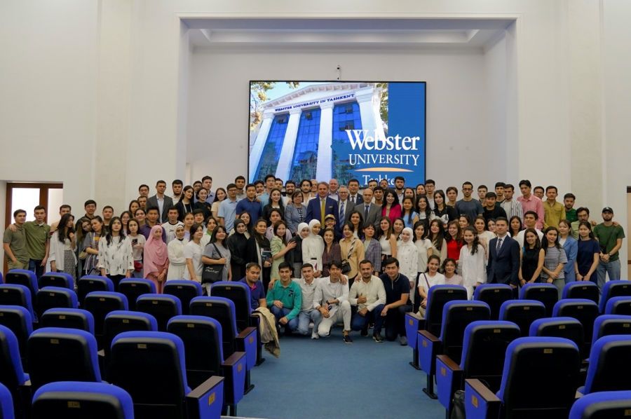 President Julian Z. Schuster, Vice President for Academic Affairs Nancy Hellerud, WUT Rector Vassilis Polimenis, and members of the St. Louis and Tashkent administration and staff pictured with Webster Tashkent students.