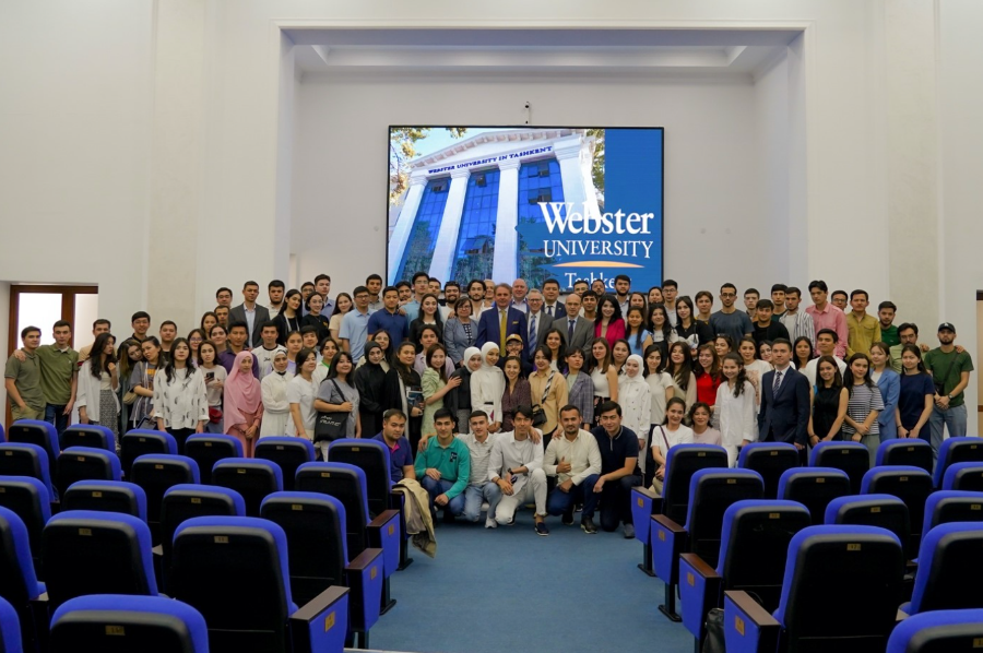 President Julian Schuster with graduate students on the Tashkent Campus earlier this year