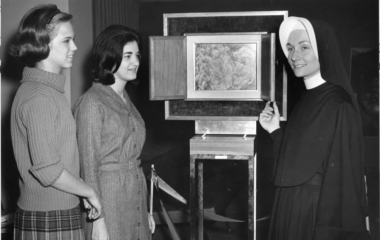 Sister Gabriel Mary Hoare is talking to two unidentified Webster University (then College) students. Photo is believed to be from the early 1960s.