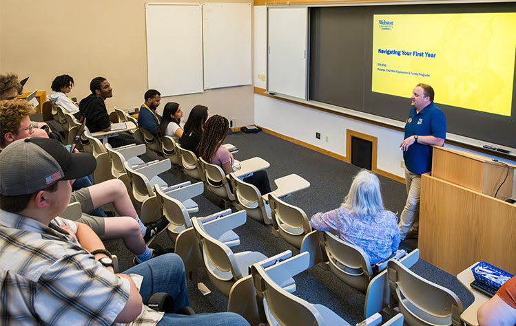 TAP students attend a presentation with Billy Ratz, Director of First Year Experience and Family Programs. 