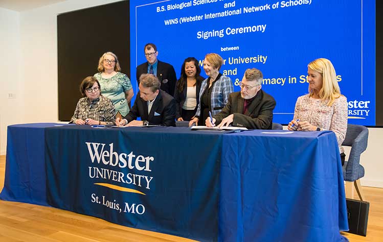 The signing ceremony between Webster and UHSP