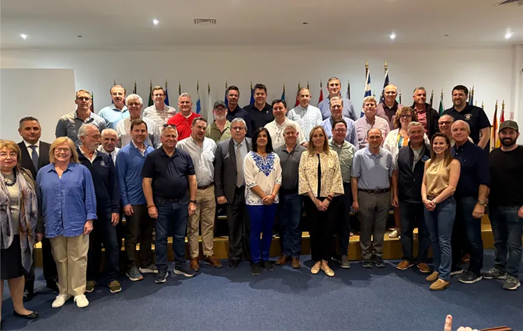 Webster Athens officials, U.S. members of Congress and AHEPA delegates pose for a photo in the Athens Cultural Center.