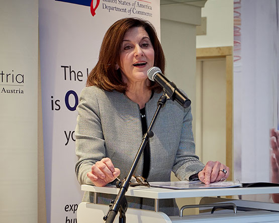 Victoria Reggie Kennedy speaks at a podium during the event in the Palais Wenkheim.