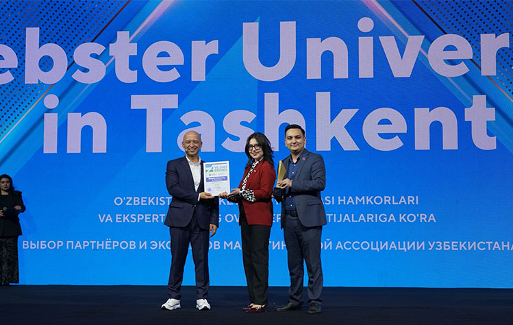 Representatives from Webster Tashkent accept the Brand of the Year 2023 award.