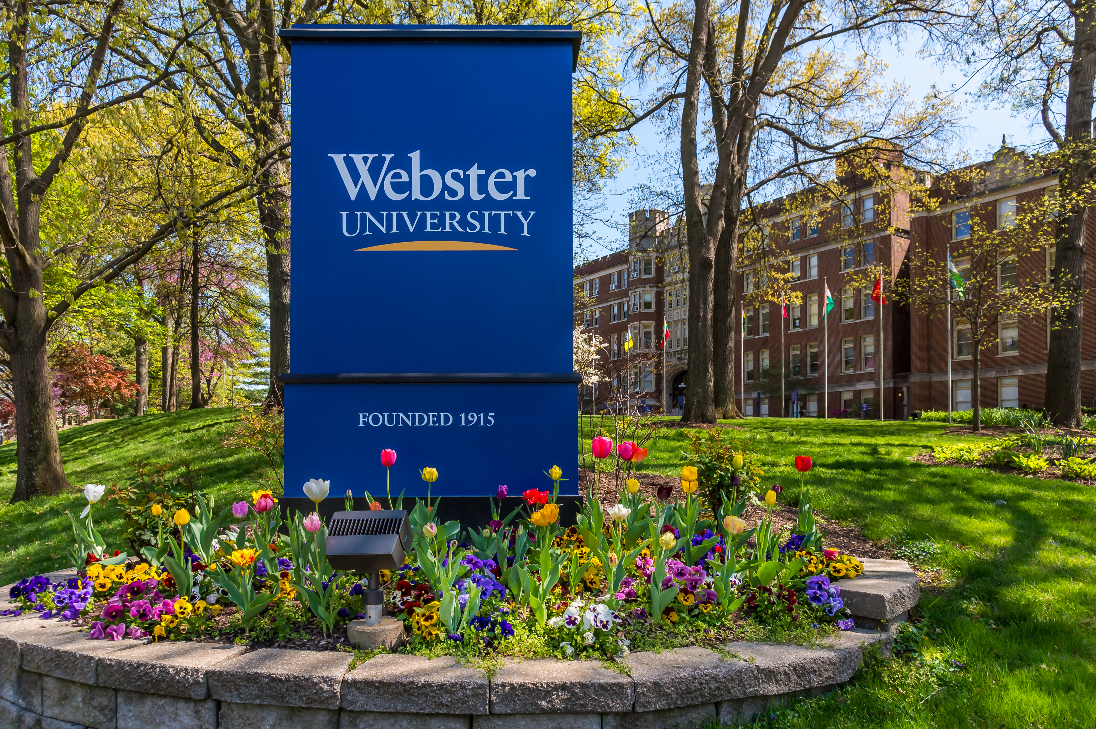 Webster University Entrance Sign in the Spring.