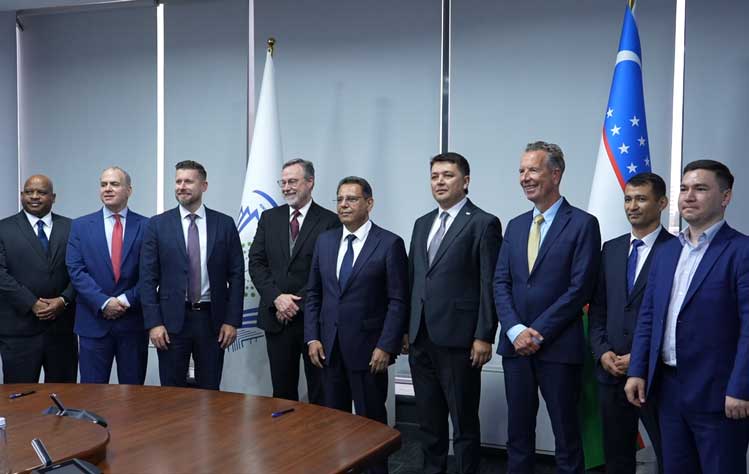 Officials with Webster University and the Uzbekistan Ministry of Education pose together after signing a 10-year partnership extension.