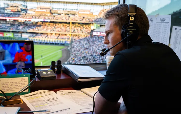 Zach Goodman calling a baseball game from the booth